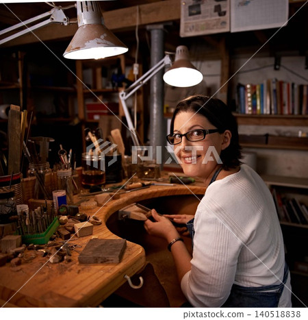 Portrait, woman and tools with wood in workshop with craftsmanship, smile and handmade design with creativity. Woodwork, artist and creative person at workspace with equipment for handicraft or hobby 140518838