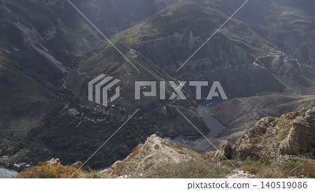 River Flows Through Canyon Landscape, Vast Panoramic Shot Of Canyon River From Above With Village And Foliage. Creative River Flows Through Canyon Landscape, Vast Panoramic Shot Of Canyon River From Above With Village And Foliage. Creative 140519086