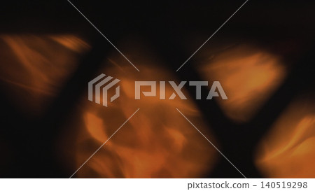 Intimate Atmosphere Created By Amber Embers Softly Pulsing Beneath Metal Lattice In Cozy Retreat. Media Intimate Atmosphere Created By Amber Embers Softly Pulsing Beneath Metal Lattice In Cozy Retreat. Media 140519298