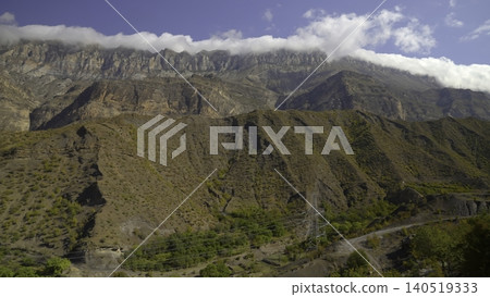 Steep Cliffs And Winding Road View, Rugged Canyon Landscape With Settlement And Natural Features. Creative Steep Cliffs And Winding Road View, Rugged Canyon Landscape With Settlement And Natural Features. Creative 140519333