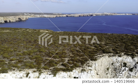 Narrow Rocky Ledge Overlooking Sea. High Precipice With Coastal Vegetation And Stunning Seascape. Media Narrow Rocky Ledge Overlooking Sea. High Precipice With Coastal Vegetation And Stunning Seascape. Media 140519666