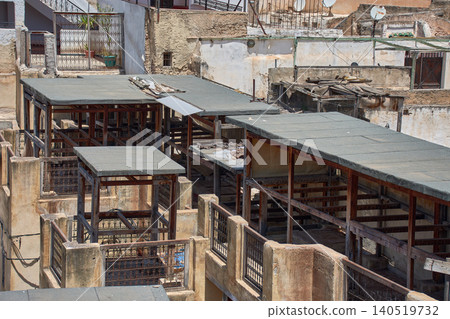 The dye vats of the historic Chouara Tannery showcase the artisanal leatherworking process in the medina of Fez 140519732