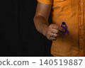 Support with a ribbon to raise awareness for health issues 140519887