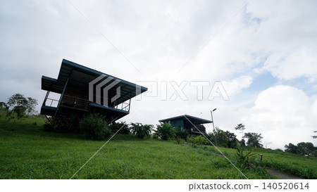 Eco lodge buildings on rural costa rica hillside Eco lodge buildings on rural costa rica hillside 140520614