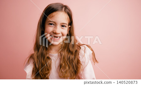 Happy smiling girl showing missing tooth childhood Happy smiling girl showing missing tooth childhood 140520873