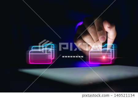 Professional using stylus on tablet with glowing neon digital folders transferring data. Futuristic document management system, cloud storage, file sharing and business technology concept. 140521134