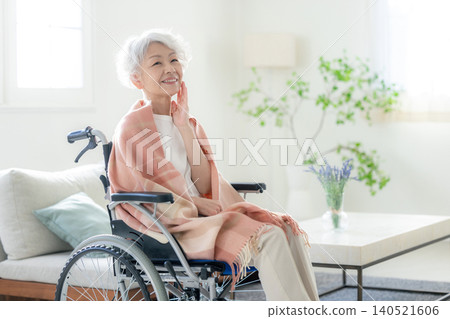 Senior woman sitting in a wheelchair 140521606