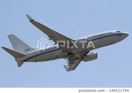 A U.S. Navy C-40A Clipper transport aircraft taking off. A U.S. Navy C-40A Clipper transport aircraft taking off. 140521784