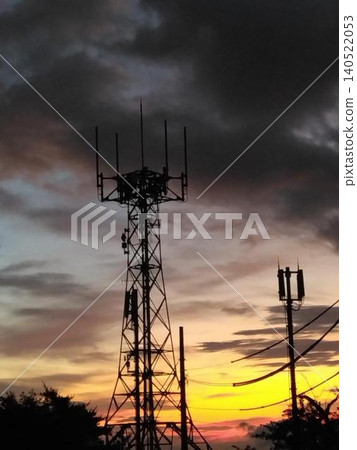 The transmission tower at dawn ① The transmission tower at dawn ① 140522053