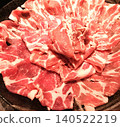 Thinly sliced meat for shabu-shabu and sukiyaki, beautifully arranged on a large plate. 140522219