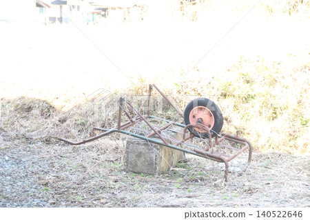 An old unicycle, an image of ruins. 140522646