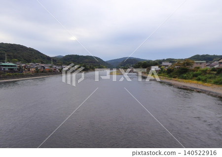 View of the upstream from Uji Bridge, Tachibanajima, Uji Shrine, and Amagase (Uji City, Kyoto Prefecture) View of the upstream from Uji Bridge, Tachibanajima, Uji Shrine, and Amagase (Uji City, Kyoto Prefecture) 140522916