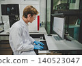Scientist working with advanced laboratory computer system for research and analysis 140523047