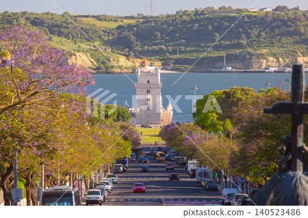 Belem Tower Viewed Along Tree Lined Avenue in Lisbon Portugal 140523486