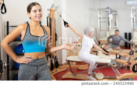 Young woman posing in pilates studio 140523490