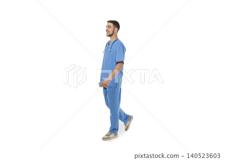 Doctor dressed in blue scrubs walking with confidence, on white Doctor dressed in blue scrubs walking with confidence, on white 140523603