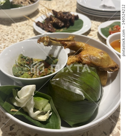Indonesian traditional cuisine and sambal sauce 140524212