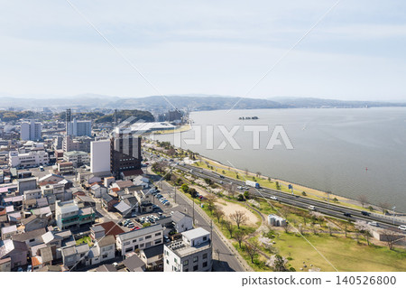 A panoramic lakeside landscape in Shimane Prefecture, offering a view of Lake Shinji and the city of Matsue. A panoramic lakeside landscape in Shimane Prefecture, offering a view of Lake Shinji and the city of Matsue. 140526800