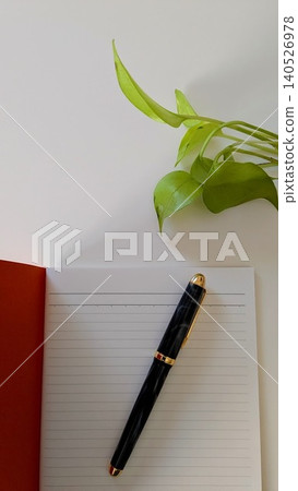 Notebook and pen Notebook and pen 140526978