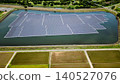 [Aerial view] Floating mega solar power plant installed on a reservoir and rural landscape (Renewable energy, SDGs) 140527076