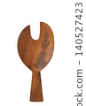 Wooden salad server fork isolated on white background. Top view of eco-friendly kitchen utensil for serving 140527423