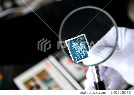 Image of a stamp collector and on-site appraisal and purchase service. Image of a stamp collector and on-site appraisal and purchase service. 140528076