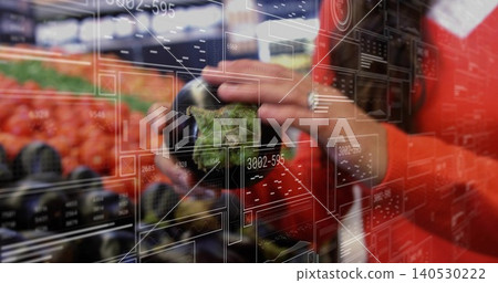 Holding woman's hands inspecting dark green artichoke in grocery aisle with tomatoes AR HUD red top Holding woman's hands inspecting dark green artichoke in grocery aisle with tomatoes AR HUD red top 140530222