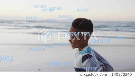 Smiling kid facing right at shore wearing jacket and striped shirt blue numeric overlay, copy space Smiling kid facing right at shore wearing jacket and striped shirt blue numeric overlay, copy space 140530240