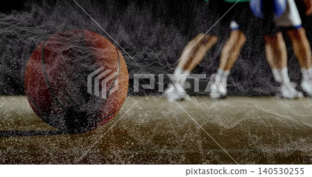Resting basketball releasing particle mesh on shiny court, players in shorts and shoes, copy space Resting basketball releasing particle mesh on shiny court, players in shorts and shoes, copy space 140530255