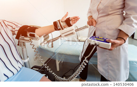 Patient on CPM (continuous passive range of motion) machines. Patient on CPM (continuous passive range of motion) machines. 140530406
