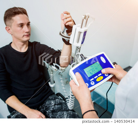 Patient on CPM (continuous passive range of motion) machines. 140530414