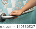 Asian elderly woman use toilet bathroom handle security, healthy strong medical. 140530527