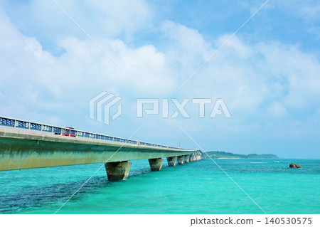Blue skies over Miyako Island, Okinawa; Ikema Bridge and the sea around Ikema Island. 140530575