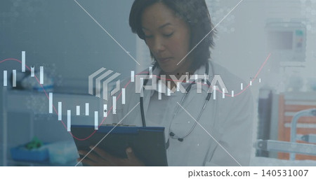 Checking woman doctor holding tablet in clinic, wearing lab coat and stethoscope, candlestick chart Checking woman doctor holding tablet in clinic, wearing lab coat and stethoscope, candlestick chart 140531007