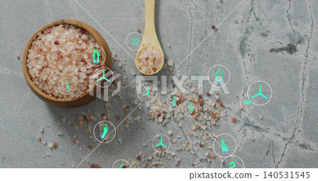 Displaying wood-bowl with coarse pink-white salt on studio slab, small wood spoon and teal icons Displaying wood-bowl with coarse pink-white salt on studio slab, small wood spoon and teal icons 140531545