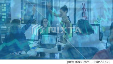 High-fiving standing colleague in sleeveless top while teammates working at desk, financial overlay High-fiving standing colleague in sleeveless top while teammates working at desk, financial overlay 140531670