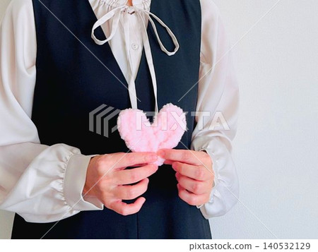 A woman with a fluffy heart 140532129