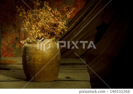 still life dried flowers in old vase on wood background still life dried flowers in old vase on wood background 140532268