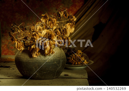 still life dried flowers in old vase on wood background still life dried flowers in old vase on wood background 140532269