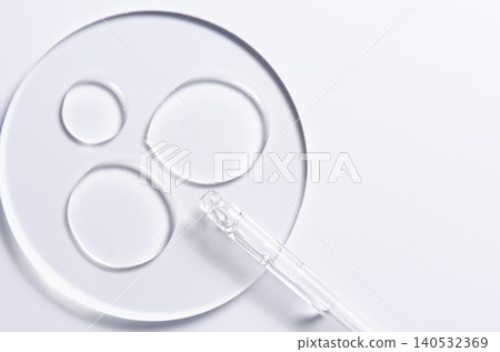 Skin serum or moisturizer or shower gel on a glass circle. A cosmetic product for body care. Skin serum or moisturizer or shower gel on a glass circle. A cosmetic product for body care. 140532369