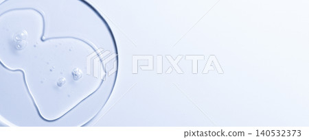 Skin serum or moisturizer or shower gel on a glass circle. A cosmetic product for body care. 140532373