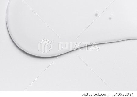 Cosmetic product in the form of a transparent drop. A moisturizing gel or serum for the face. Copy space Cosmetic product in the form of a transparent drop. A moisturizing gel or serum for the face. Copy space 140532384