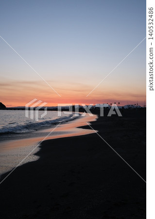 The sunset around Enoshima is bathed in orange light. The sunset around Enoshima is bathed in orange light. 140532486