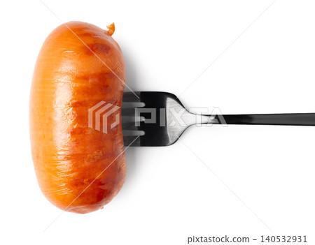 Appetizing sausage on a fork, isolated on white background Appetizing sausage on a fork, isolated on white background 140532931