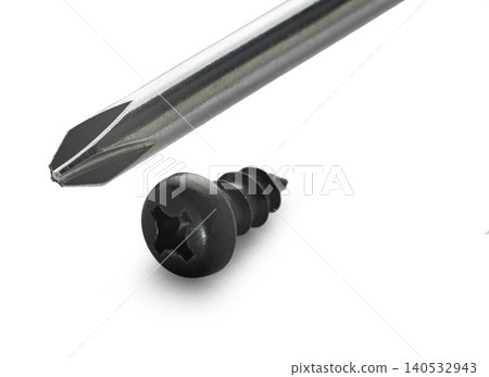 Construction screw and screwdriver on white isolated background Construction screw and screwdriver on white isolated background 140532943