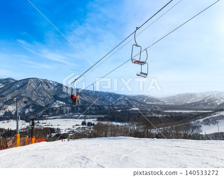 A ski lift and winter scenery of the Hakuba Norikura Onsen ski resort (Otari Village, Nagano Prefecture) A ski lift and winter scenery of the Hakuba Norikura Onsen ski resort (Otari Village, Nagano Prefecture) 140533272