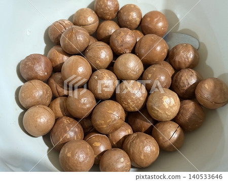 Macadamia Nuts In Shell Close Up Macadamia Nuts In Shell Close Up 140533646