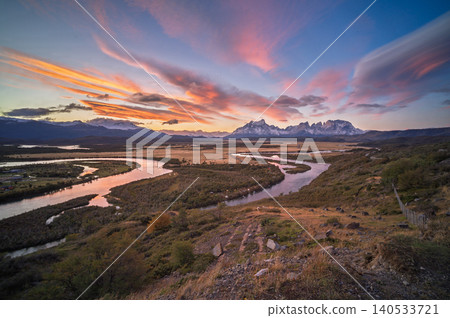 Patagonia river valley sunset, mountain peak, colorful sky Patagonia river valley sunset, mountain peak, colorful sky 140533721