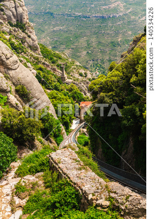 Montserrat rack railway winding through rocky mountain gorge in Catalonia Spain Montserrat rack railway winding through rocky mountain gorge in Catalonia Spain 140534226
