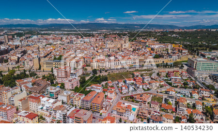 Aerial view of Tarragona historic center with medieval walls cathedral and dense Mediterranean urban architecture in Spain Aerial view of Tarragona historic center with medieval walls cathedral and dense Mediterranean urban architecture in Spain 140534230
